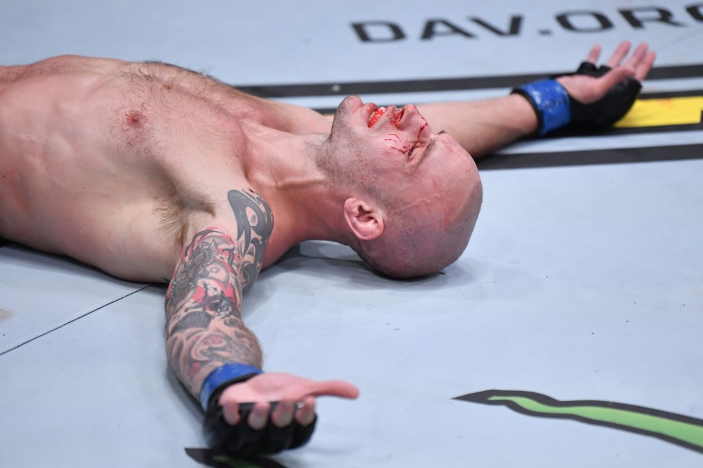 Sasha Palatnikov reacts after his TKO victory over Louis Cosce in their welterweight bout at UFC 255, Photo: Jeff Bottari/Zuffa LLC