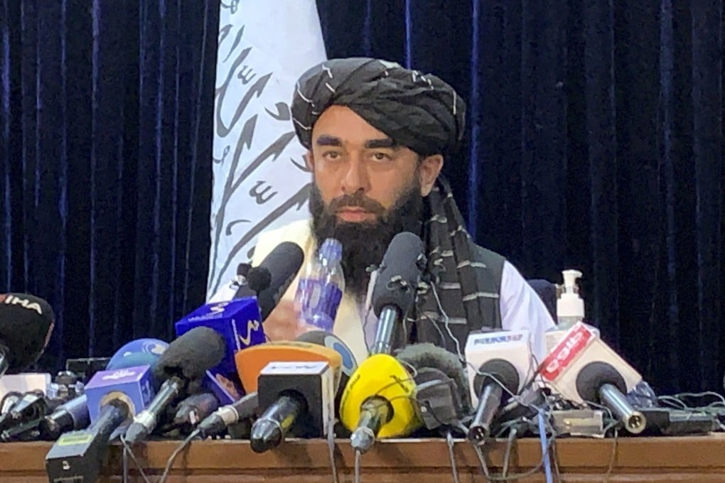 Taliban spokesman Zabihullah Mujahid speaks at his first news conference in Kabul on Tuesday. Photo: AP