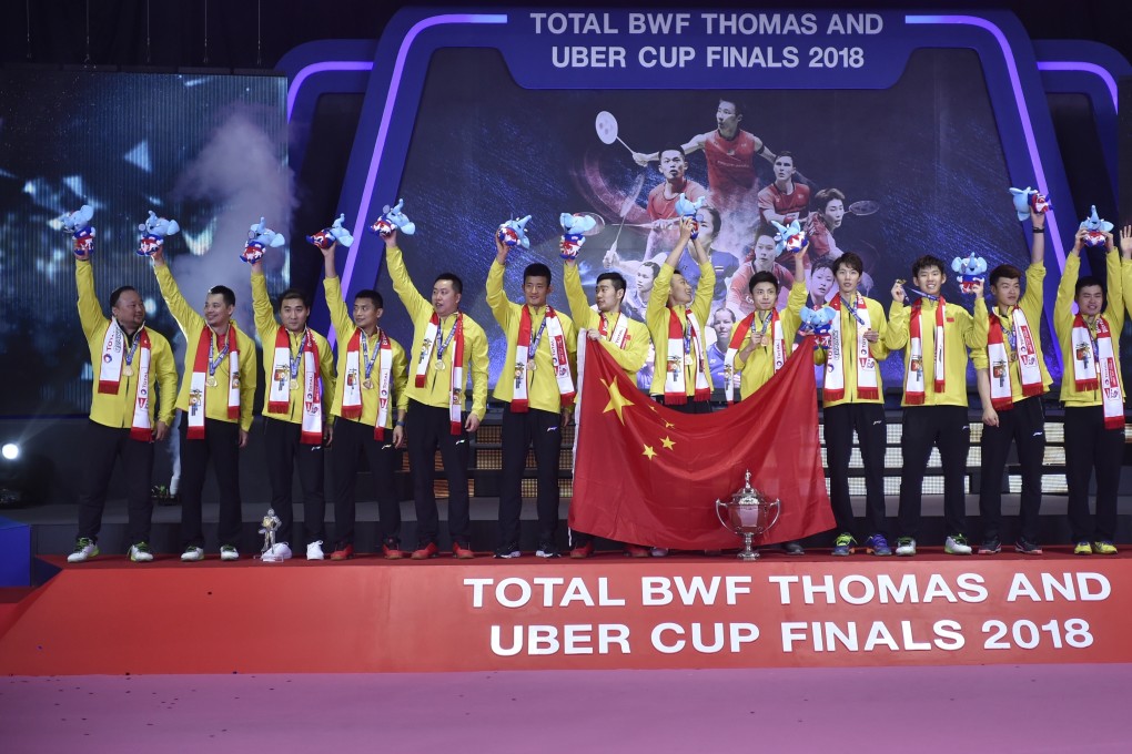 Team China celebrates during the medal presenting ceremony after winning the final against team Japan at the 2018 Thomas Cup badminton tournament in Bangkok, Thailand. Photo: Xinhua
