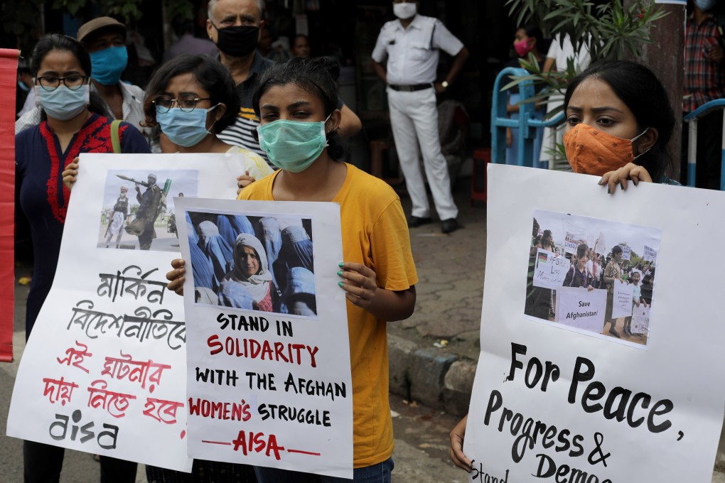 Members of All India Students Association (AISA) take part in a protest in Kolkata in solidarity with the Afghan people after the Taliban takeover of Afghanistan. India is grappling with how to adjust to the shift in regional geopolitics. Photo: EPA-EFE