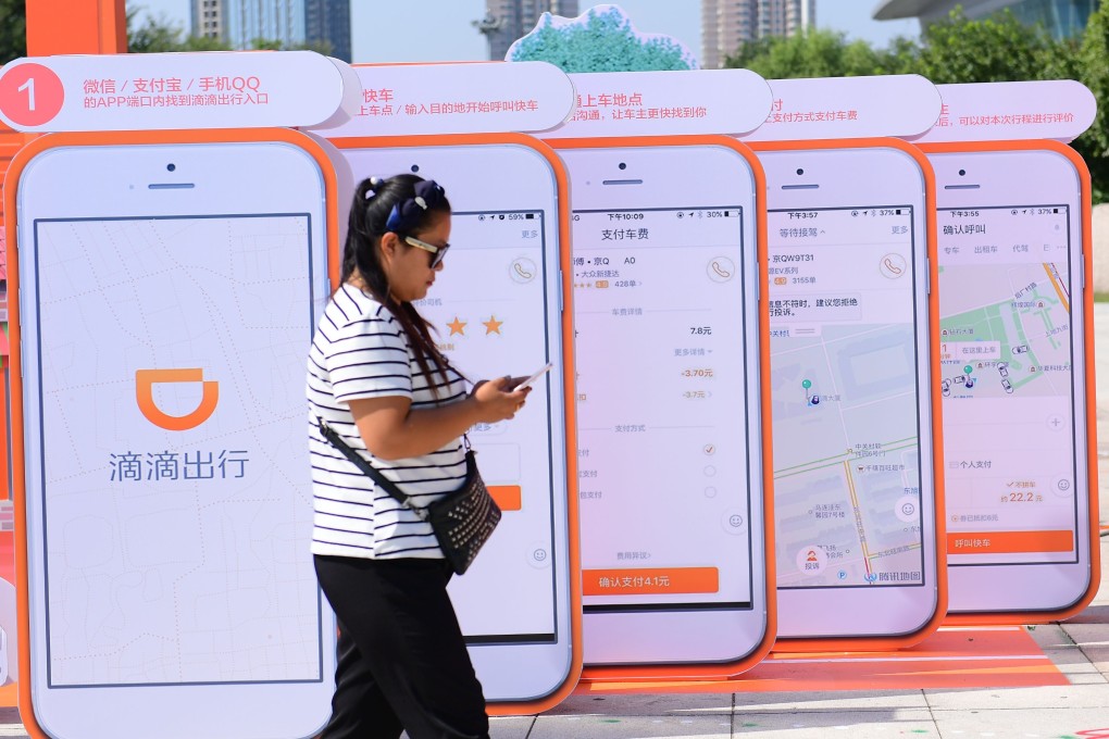 The advertisements of taxi-hailing and car-service app Didi Chuxing in Shenyang city in north-east China's Liaoning province on 21 September 2017. Photo: Imaginechina.