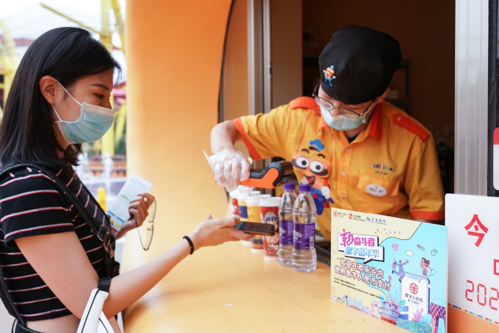 The digital yuan – developed by the central bank and now under trial in a dozen cities – adopts a two-tier structure, where the central bank issues the digital currency to authorised commercial banks, which then exchanges and circulates it to the public. Photo: Xinhua