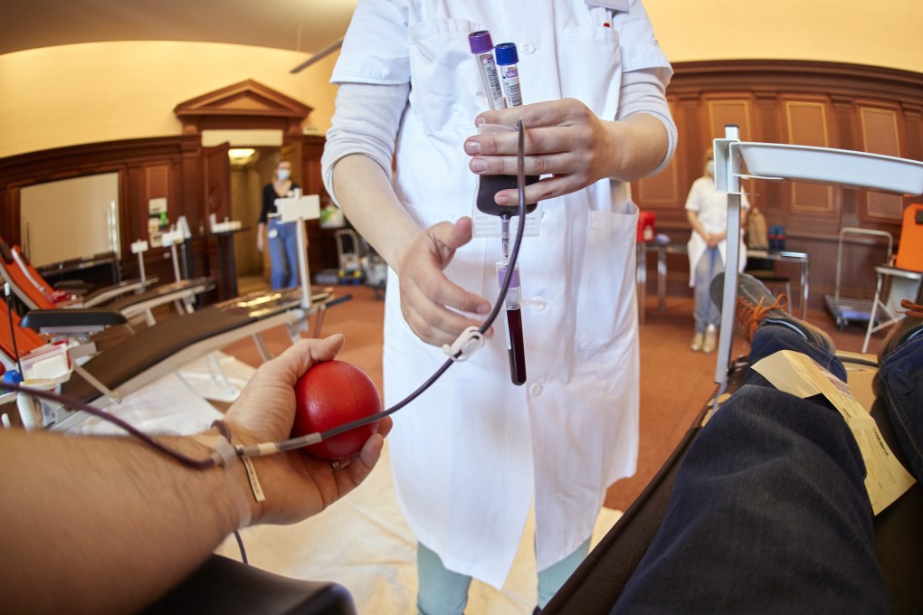 A nurse collects samples at a blood donation centre in Lausanne, Switzerland. File photo: Reuters