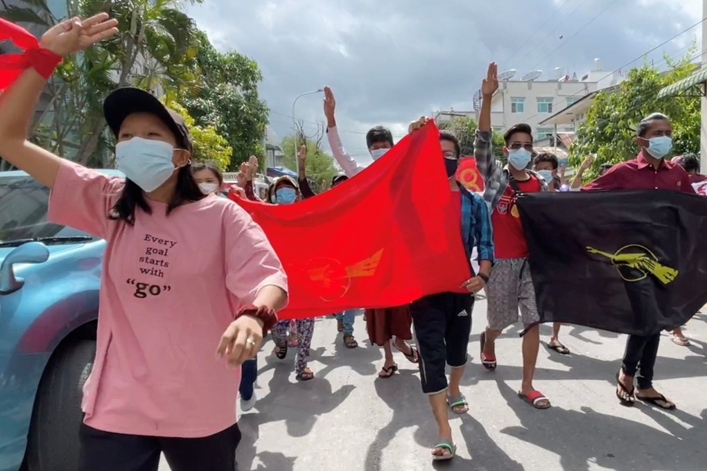 Anti-coup protesters march in Mandalay on August 8, 2021. Photo: Social media image via Reuters