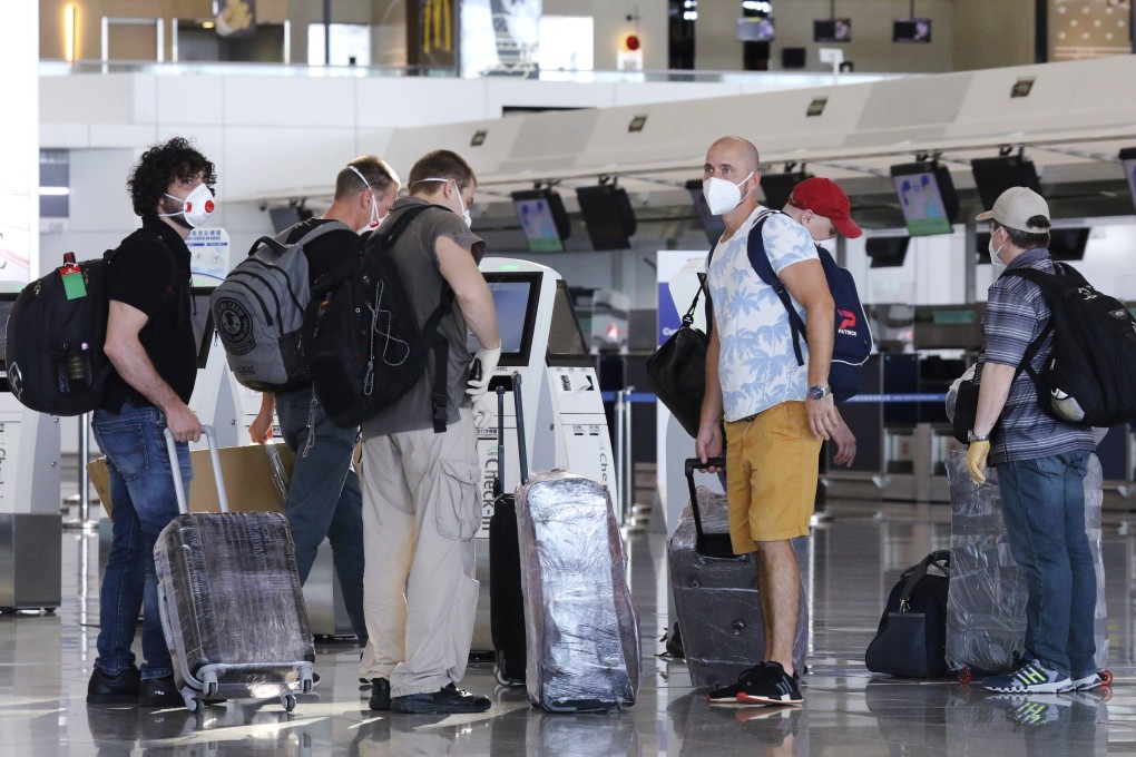Travellers arrive at Hong Kong International Airport in July. Photo: Dickson Lee