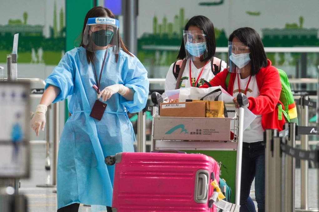 Passengers from the Philippines arrive at Hong Kong International Airport in April. Photo: Winson Wong