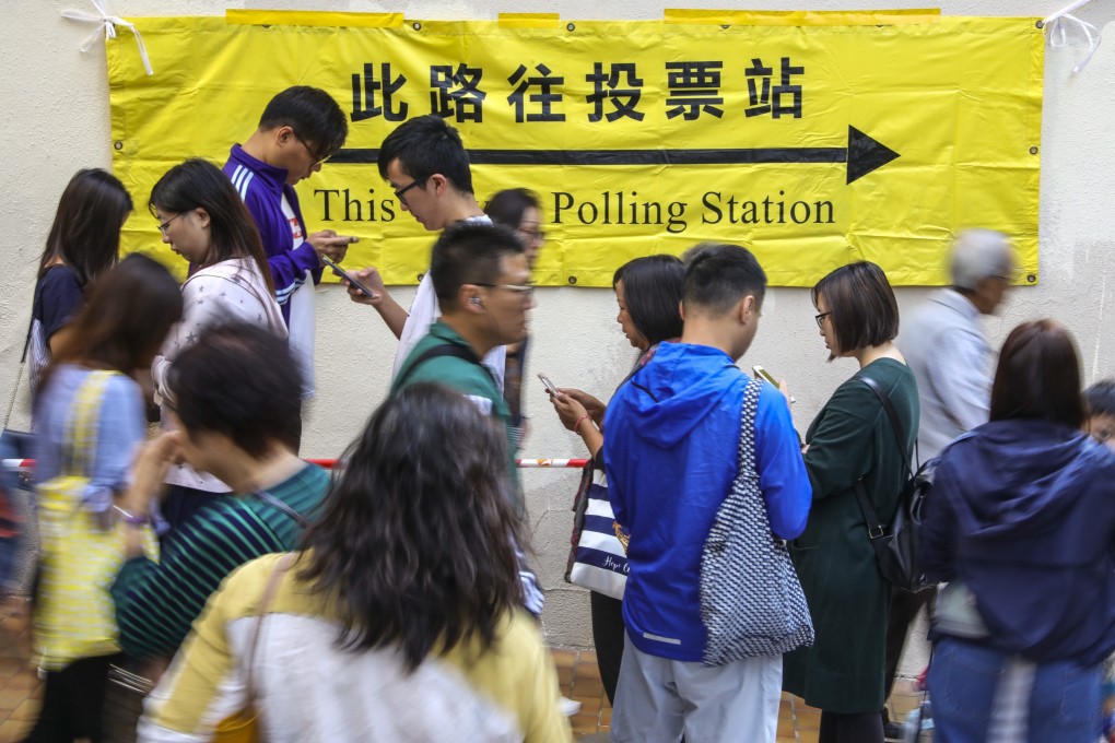 People queue at the polling station in Aberdeen Sports Centre to vote in the district council election in 2019. Photo: May Tse
