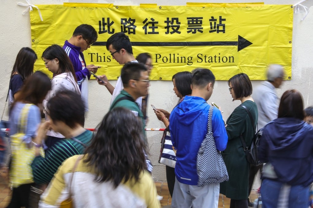 People queue at the polling station in Aberdeen Sports Centre to vote in the district council election in 2019. Photo: May Tse