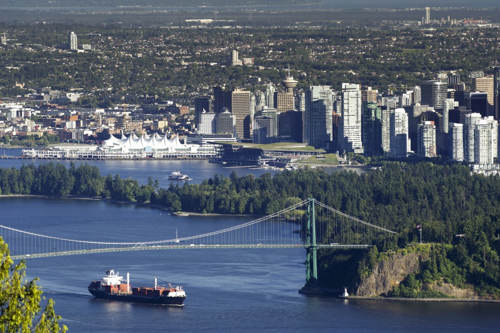 A panoramic view of Vancouver in Canada’s British Columbia province, featuring Canada Place, Burrard Inlet, Coal Harbour, Lions Gate Bridge, downtown Vancouver and Stanley Park. Photo: Shutterstock