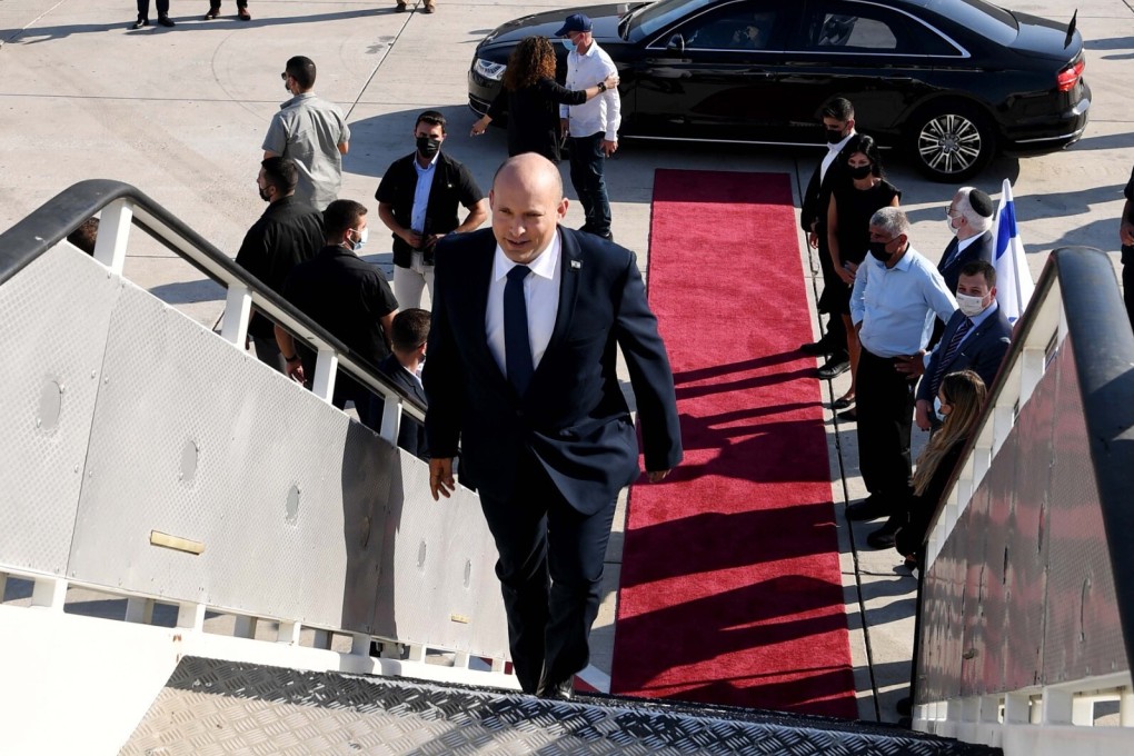 Israeli Prime Minister Naftali Bennett boards his plane for a visit to Washington on Tuesday. Photo: Avi Ohayon / GPO / DPA
