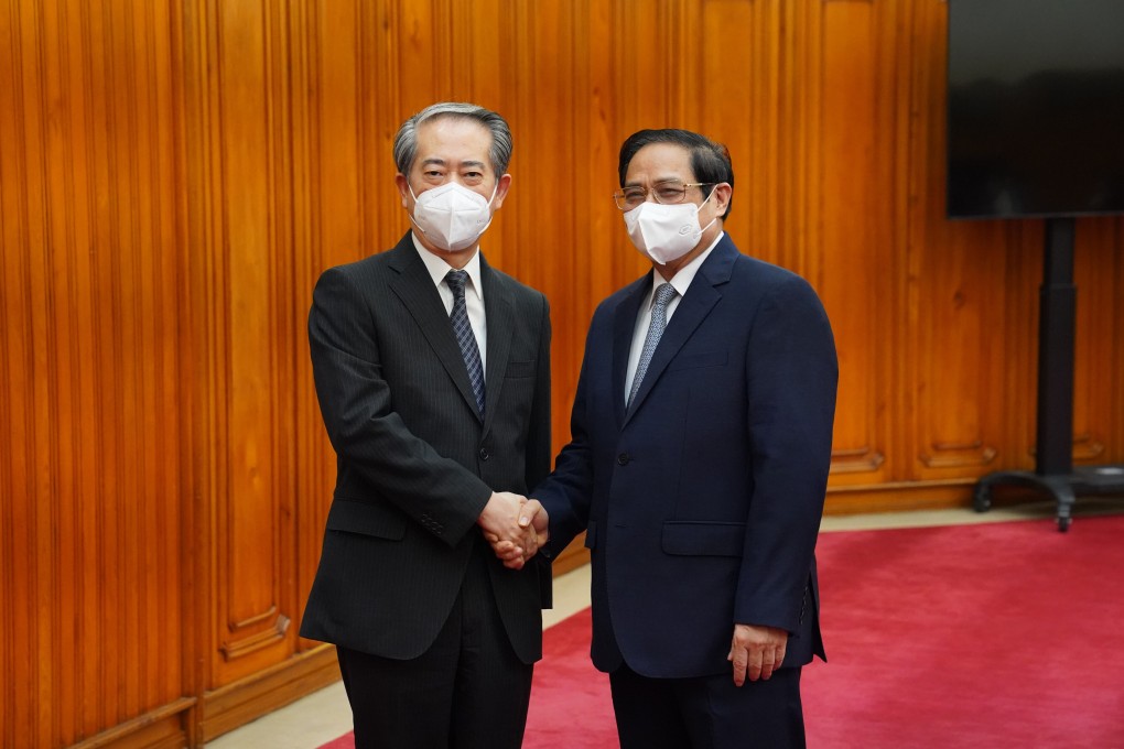 Vietnamese Prime Minister Pham Minh Chinh (right) meets Xiong Bo, the Chinese ambassador to Vietnam, on Tuesday. Photo: China Embassy in Vietnam