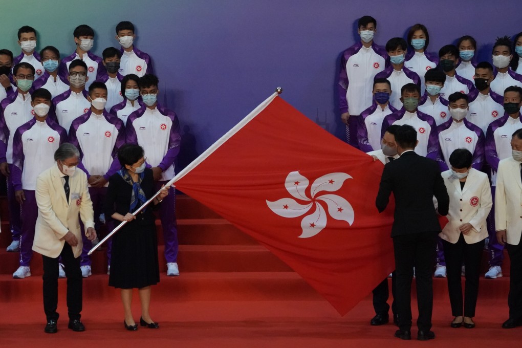 Chief Executive Carrie Lam Cheng Yuet-ngor officiates at the flag presentation ceremony for HKSAR delegation to the 14th National Games. Photo: Felix Wong