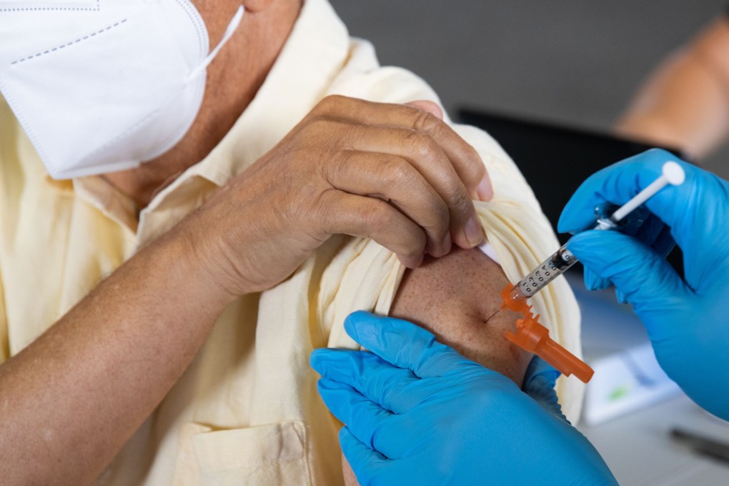 A patient receives a dose of the Pfizer-BioNTech coronavirus vaccine in the US. Photo: AFP