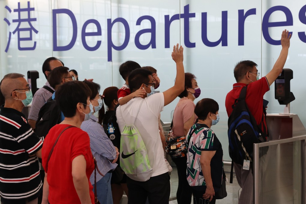 Family and friends wave goodbye to loved ones leaving the city at Hong Kong International Airport. Photo: Nora Tam