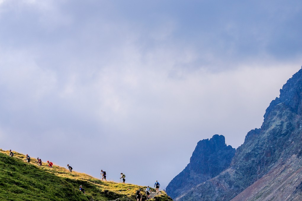 Runners on a climb during TDS at higher altitude than the main event the UTMB. Photo: Franck Oddoux / UTMB