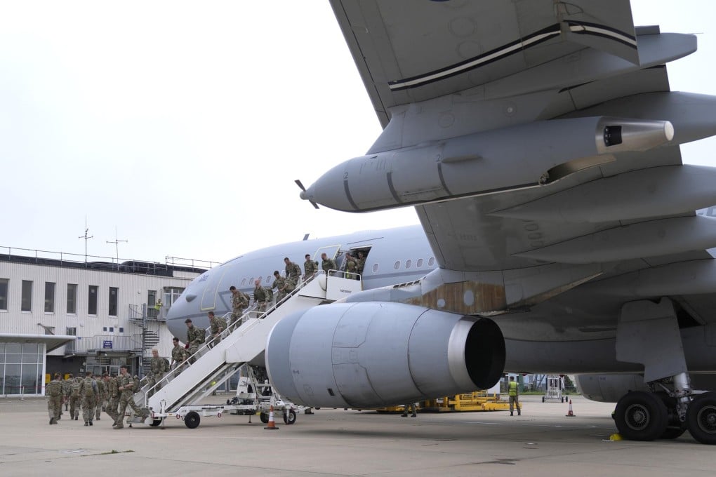 British soldiers disembark a RAF Voyager aircraft after landing at Brize Norton, Britain, following their return from Kabul. Photo: PA Wire/dpa