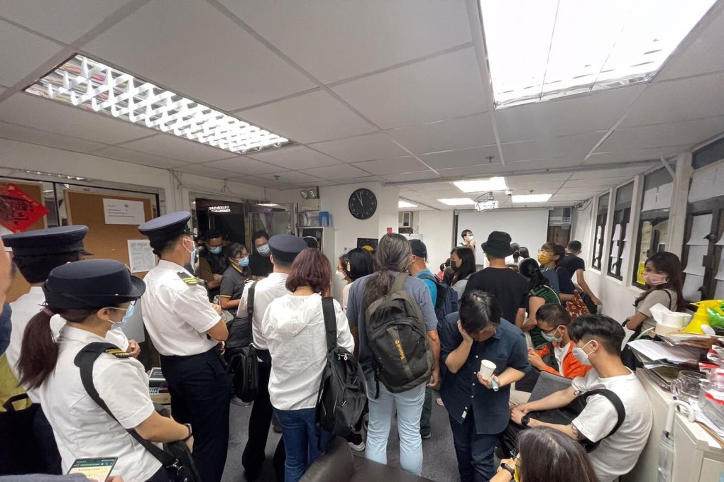 Hong Kong police and health inspectors raid a film screening conducted at the office of an opposition district councillor on Friday night. Photo: Facebook