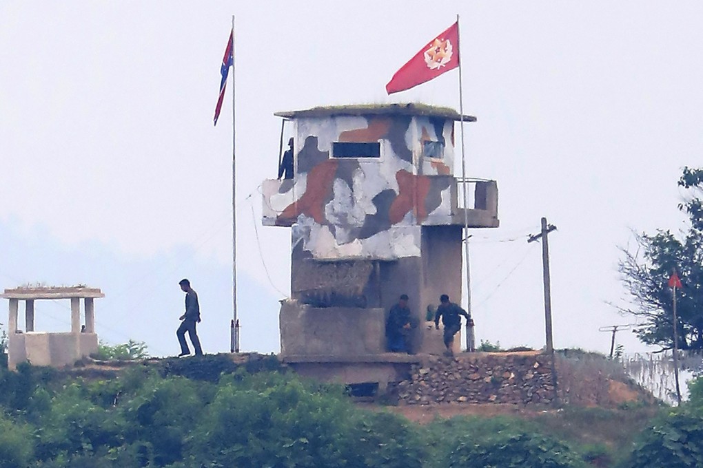 North Korean army soldiers are seen at a military guard post in Paju, at the border with North Korea, South Korea. UN human rights investigators have asked North Korea to clarify whether it has ordered troops to shoot on sight any trespassers who cross its northern border in violation of the country's pandemic closure. Photo: AP