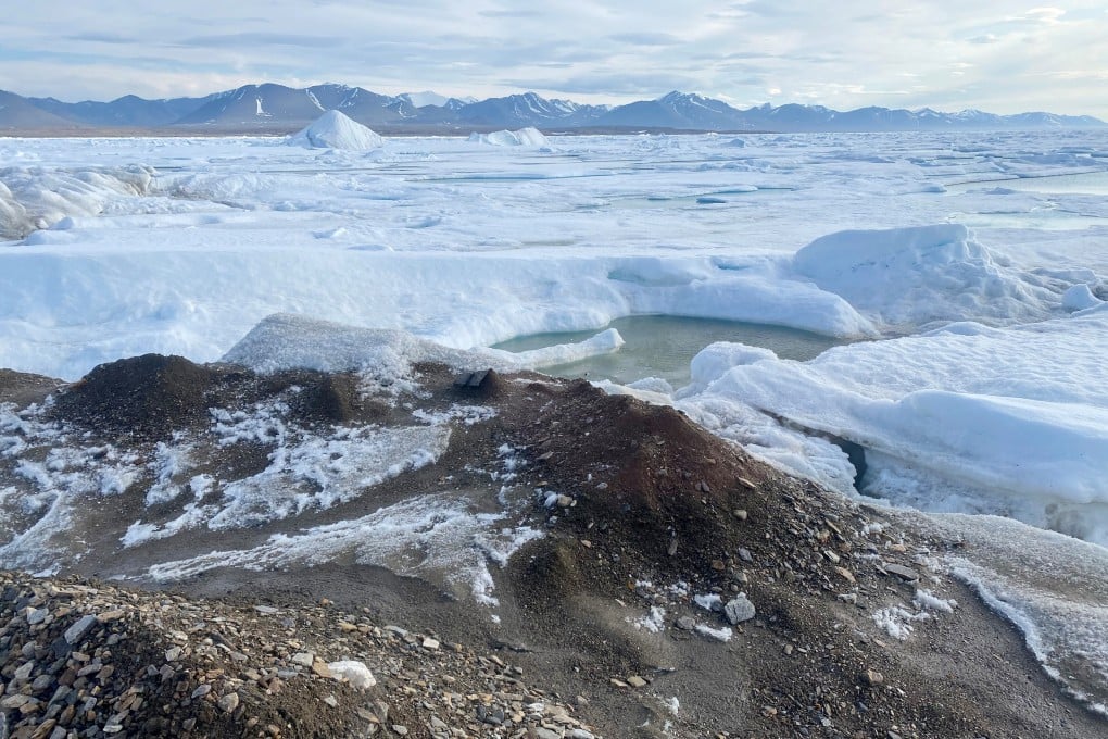 An undated handout image with a view of a tiny island off the coast of Greenland that scientists on an expedition say is the world's northernmost point of land. Photo: Julian Charriere/Reuters