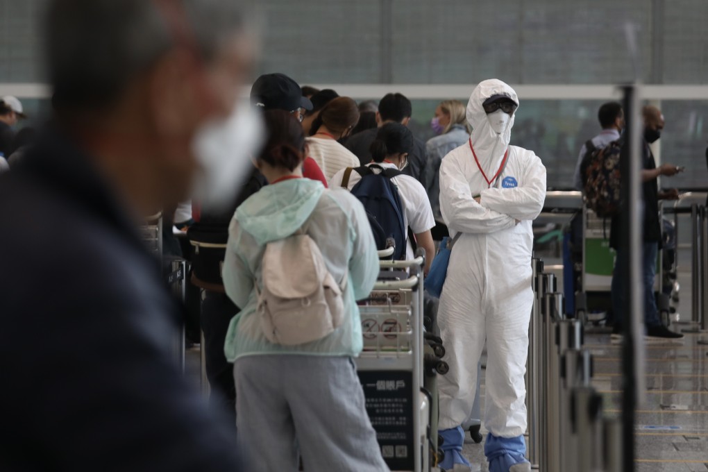Passengers queue at the arrival hall of Hong Kong International Airport for quarantine on Aug 19, 2021. Photo: Xiaomei Chen