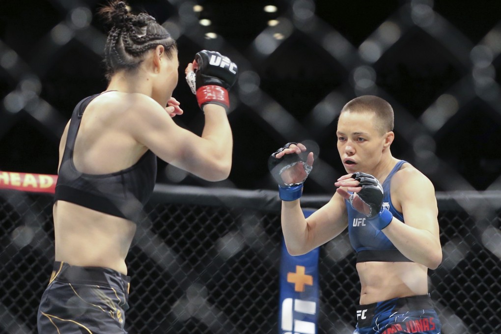 Zhang Weili (left) during her strawweight title bout with Rose Namajunas at UFC 261. Photo: AP