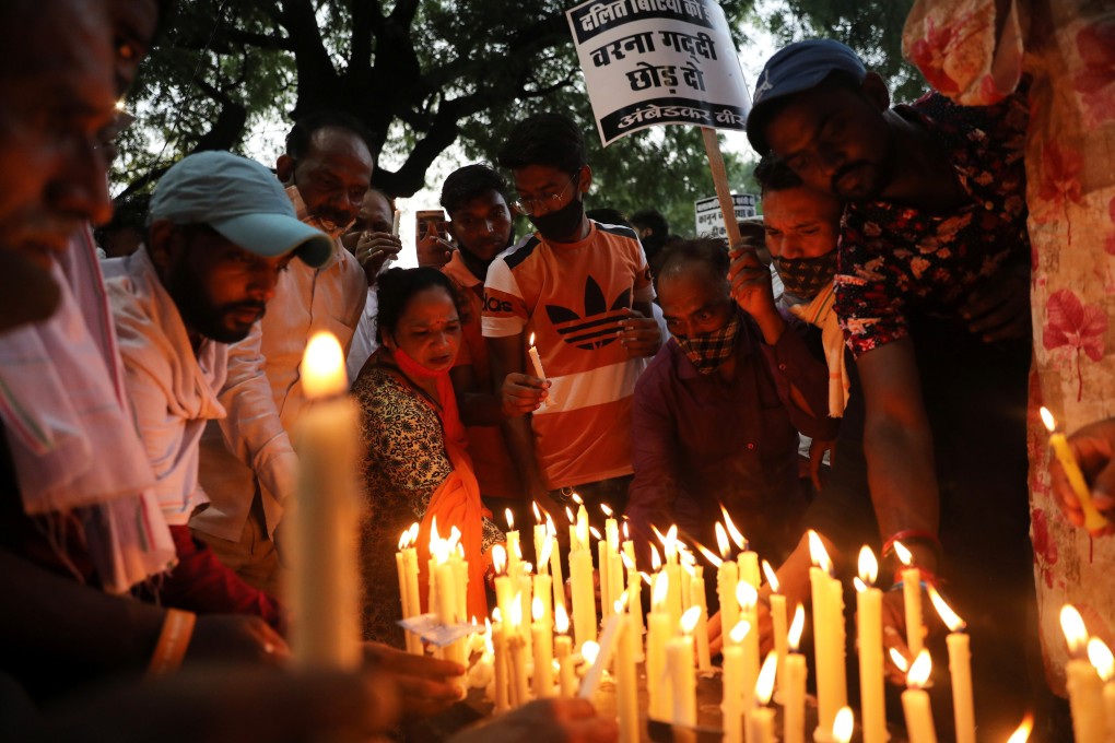People attend a candlelight vigil following the rape and murder of a young girl in New Delhi earlier in August. Photo: Reuters