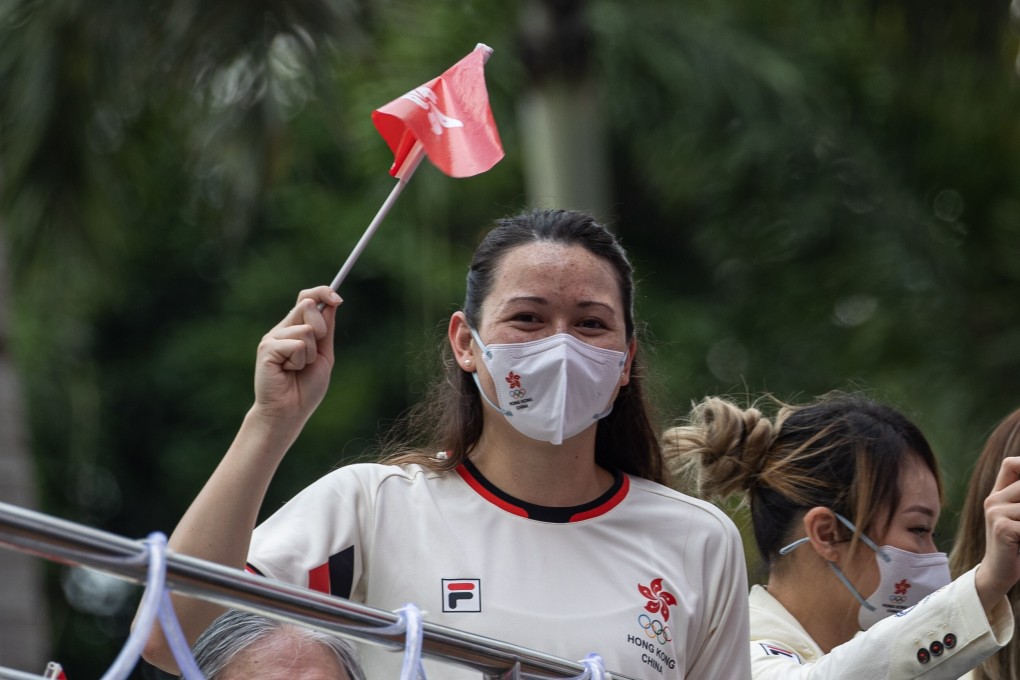 Hong Kong silver medallist swimmer Siobhan Haughey and other Tokyo 2020 Olympic Games athletes on a bus parade in Hong Kong in August. Photo: EPA