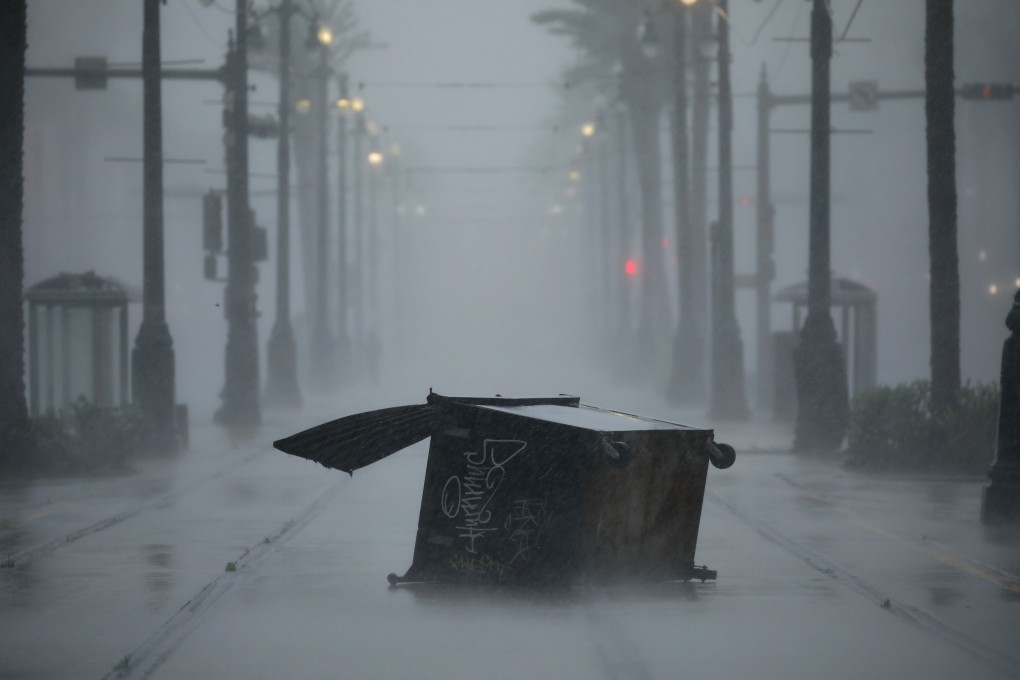 A dumpster tossed by gusting winds along Canal Street during Hurricane Ida in New Orleans. Photo; Bloomberg