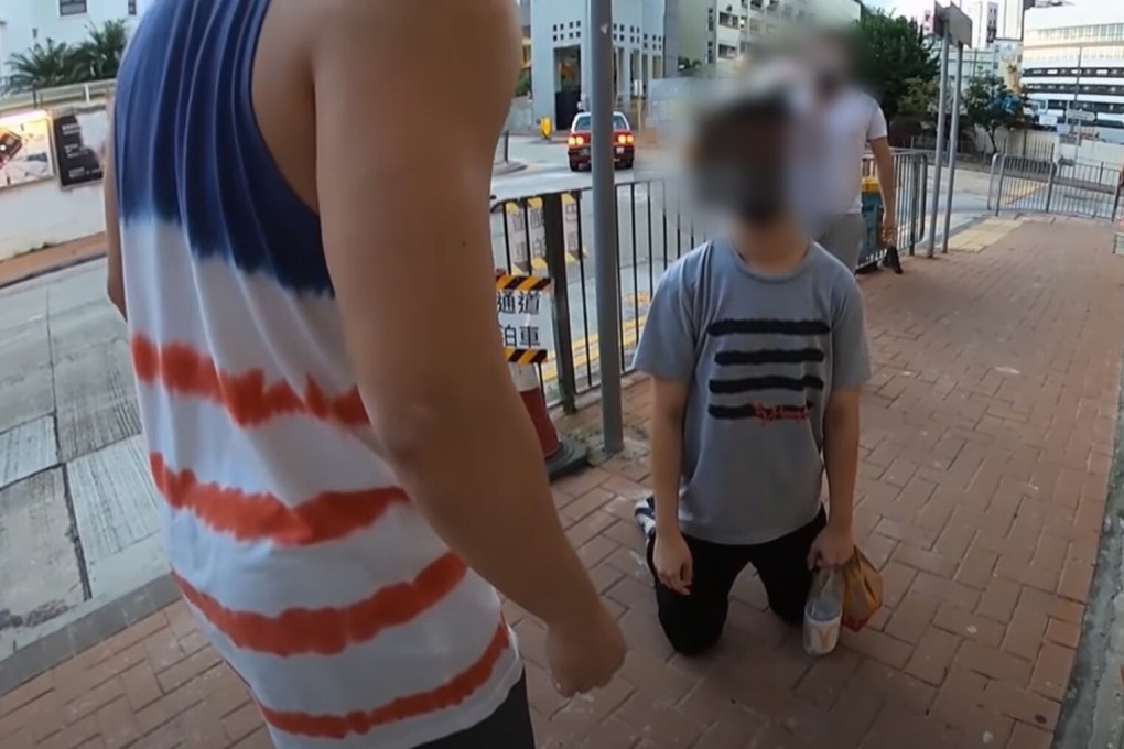 A YouTuber confronts an alleged paedophile on a Hong Kong street last month. Photo: Handout