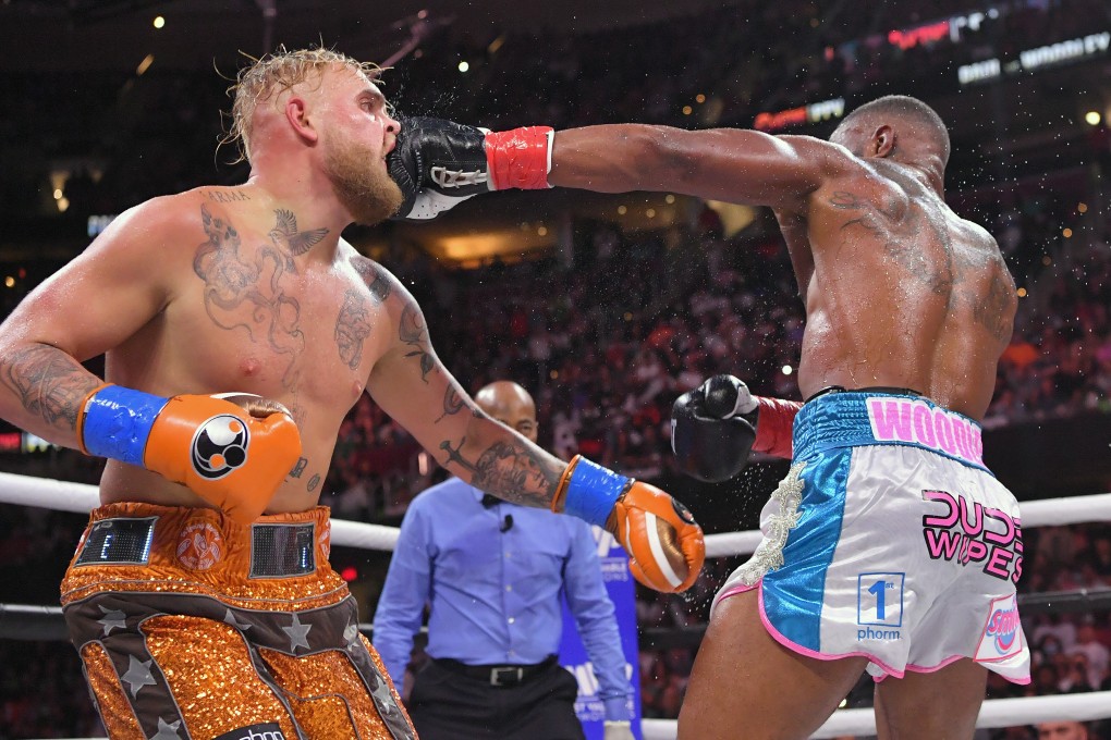 Tyron Woodley punches Jake Paul in their professional boxing cruiserweight bout in a Showtime pay-per-view event at the Rocket Mortgage Fieldhouse in Cleveland, Ohio in August. Photo: Getty Images
