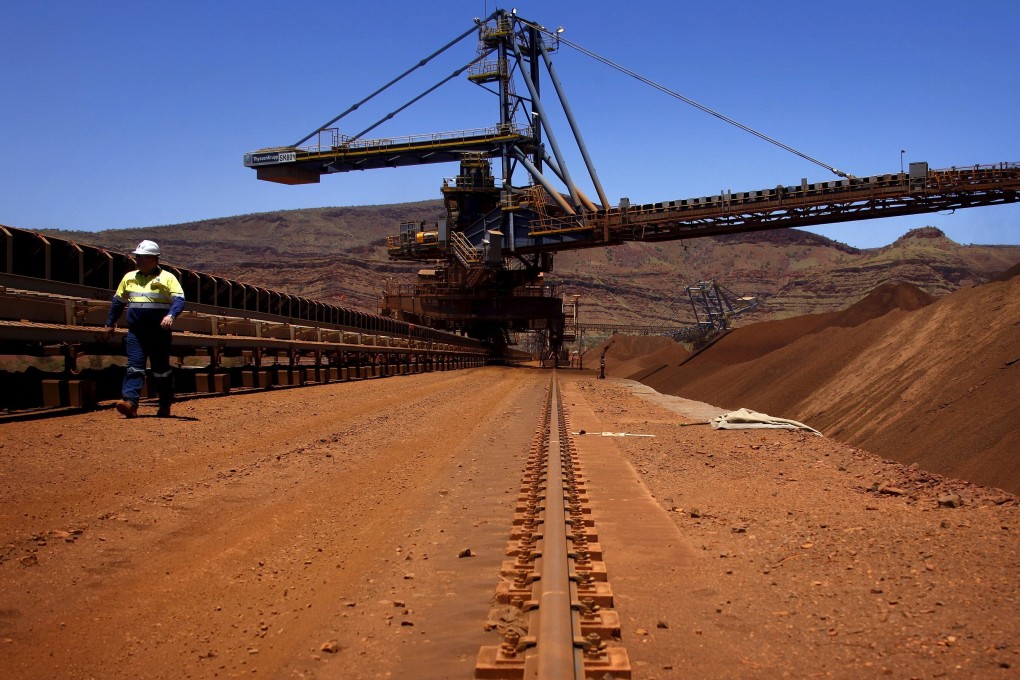Conveyor belts transport iron ore at the Fortescue Solomon mine in Western Australia. Photo: Reuters