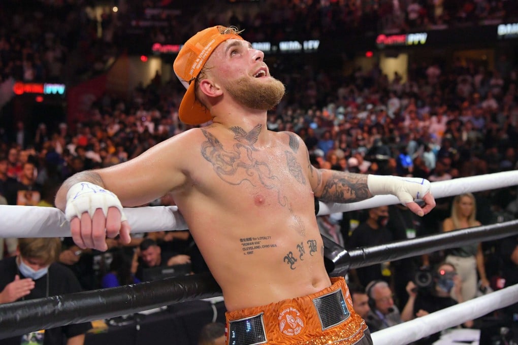 Jake Paul reacts after defeating Tyron Woodley by split decision in their cruiserweight boxing bout. Photo: AFP