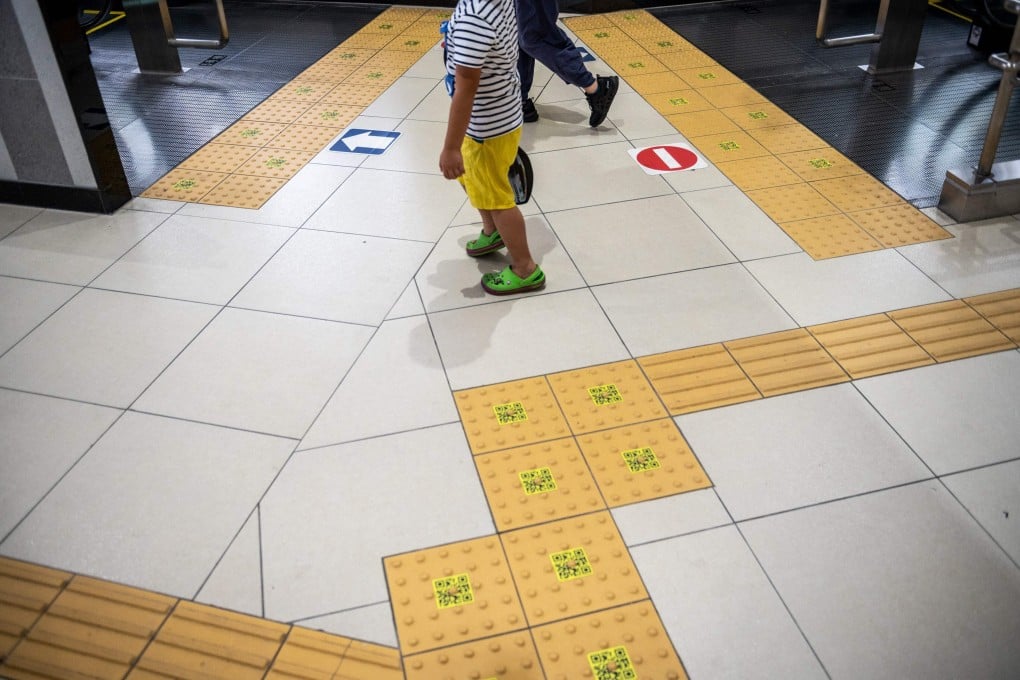 Tenji blocks, aimed at helping people with visual impairments, are seen inside a train station in Tokyo on August 29. Photo: AFP