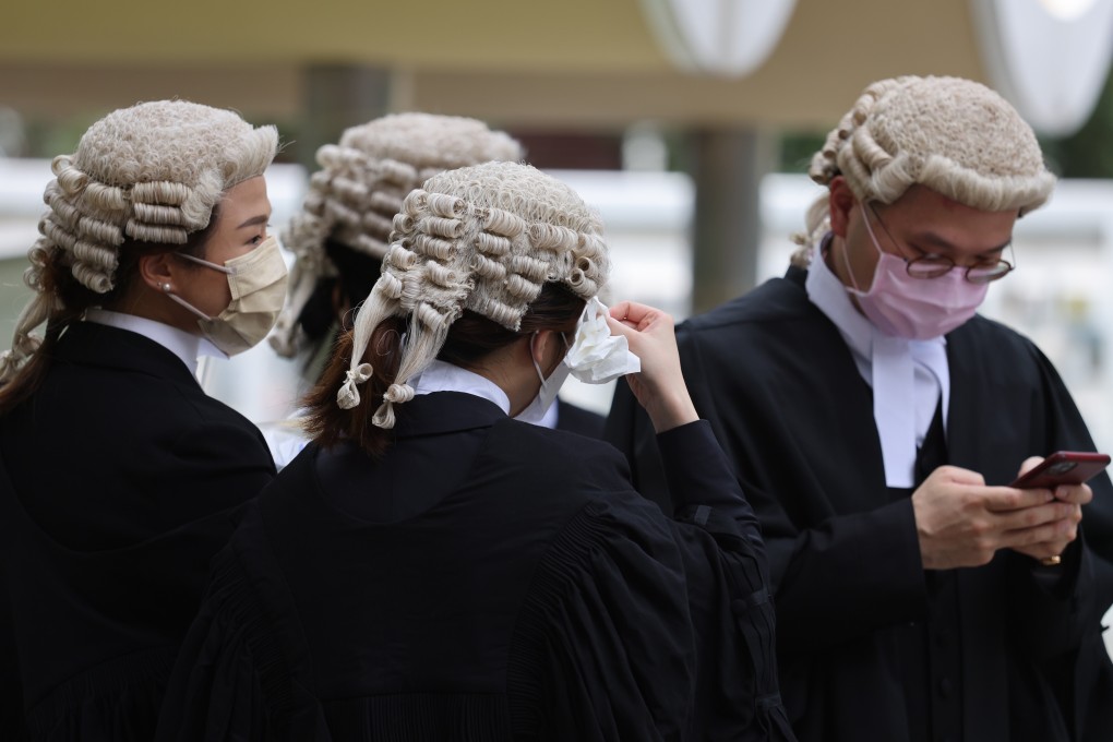 Barristers wearing wigs feel the heat in May at an appointment ceremony at the Court of Final Appeal in Central. Photo: Nora Tam