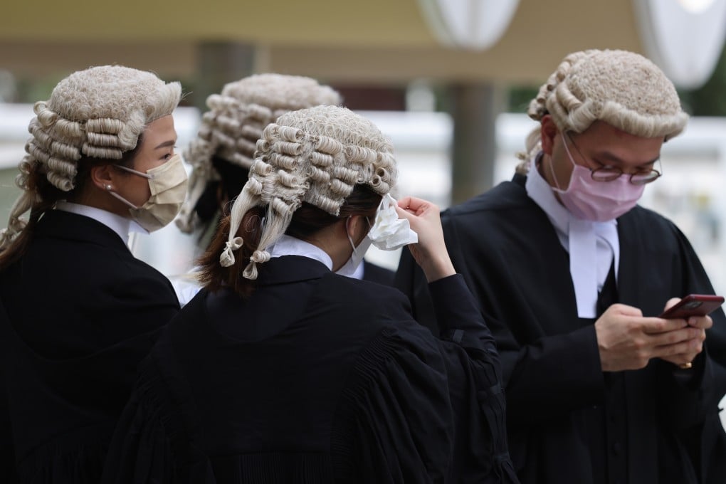Barristers wearing wigs feel the heat in May at an appointment ceremony at the Court of Final Appeal in Central. Photo: Nora Tam
