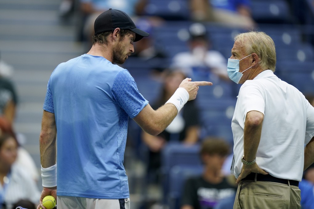 Andy Murray complains to an official between sets against Stefanos Tsitsipas during the first round of the US Open tennis championships in New York on Monday. Photo: AP