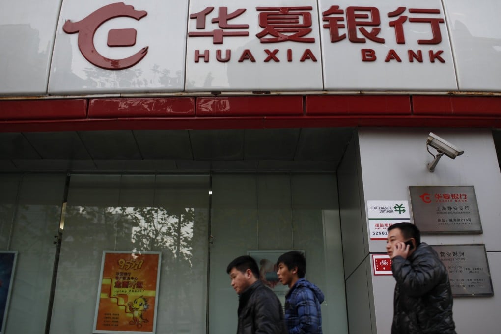 Huaxia Bank this week became the latest Chinese commercial lender to suspend its personal foreign exchange trading business amid expectations of greater geopolitical tensions and currency volatility. Photo: Reuters