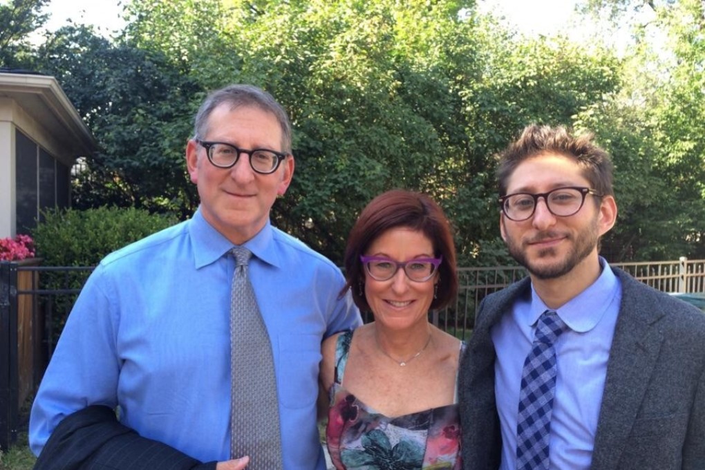 American journalist Danny Fenster (right) with his parents Buddy and Rose in Huntington Woods, Michigan. Photo: Courtesy of the Fenster Family / AFP
