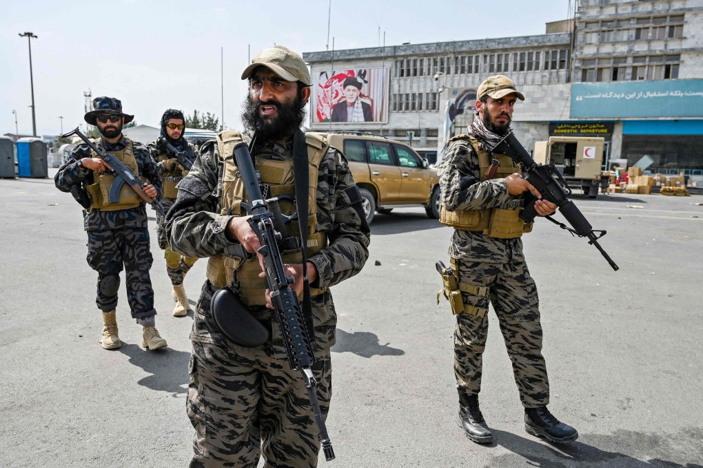 Taliban Badri special force fighters arrive at the airport in Kabul after the US pulled its final troops out of the country. Photo: AFP