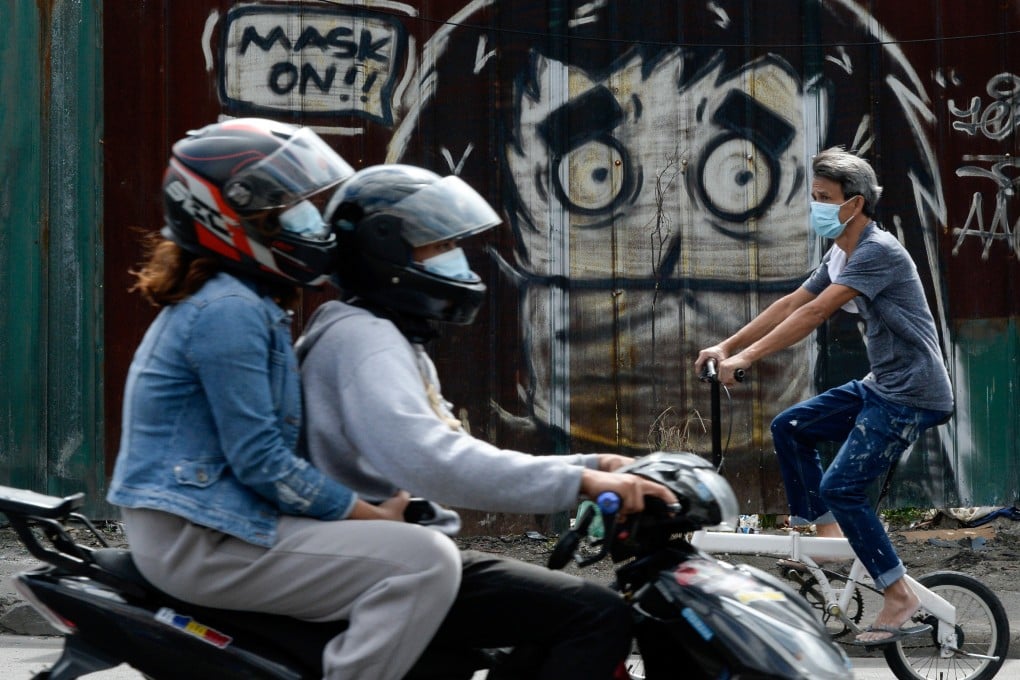A mural reminding people to wear masks in Caloocan City, Metro Manila, Philippines. Photo: Reuters