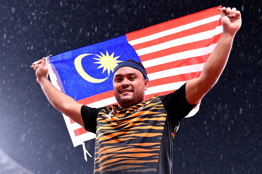 Malaysia's Muhammad Ziyad Zolkefli celebrates on Tuesday after winning gold in the men‘s shot put F20 final. He was later stripped of his medal for turning up late. Photo: Bernama/DPA