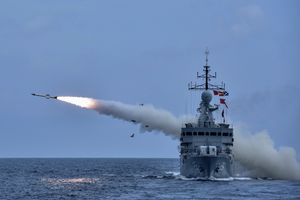 A Royal Malaysian Navy vessel fires a missile during a military exercise in the South China Sea on August 12. Malaysia is among the nations that have competing claims with China in the resource-rich waters. Photo: DPA