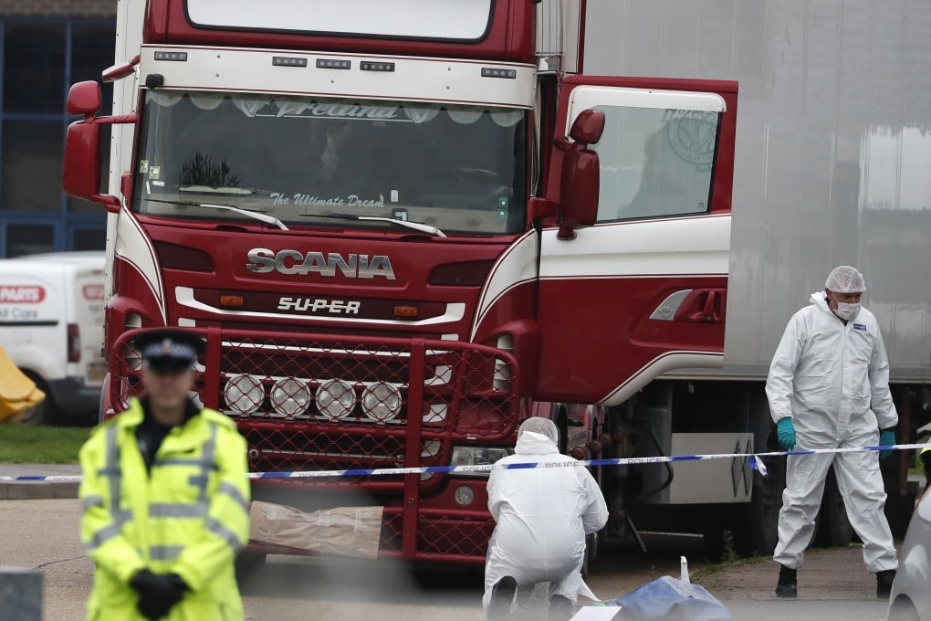 Forensics officers inspect the truck found to contain the bodies of 39 dead Vietnamese in Essex, Britain, in 2019. Photo: AP