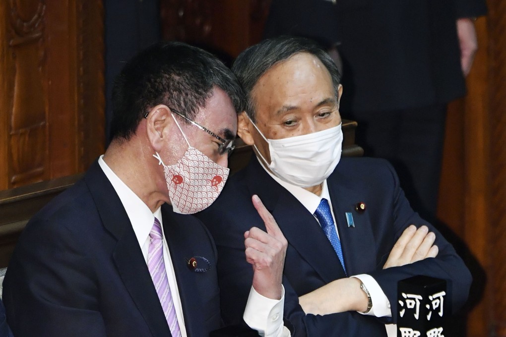 Taro Kono, left, with Japanese Prime Minister Yoshihide Suga. Suga has said he will not stand for re-election as LDP leader. Photo: Kyodo