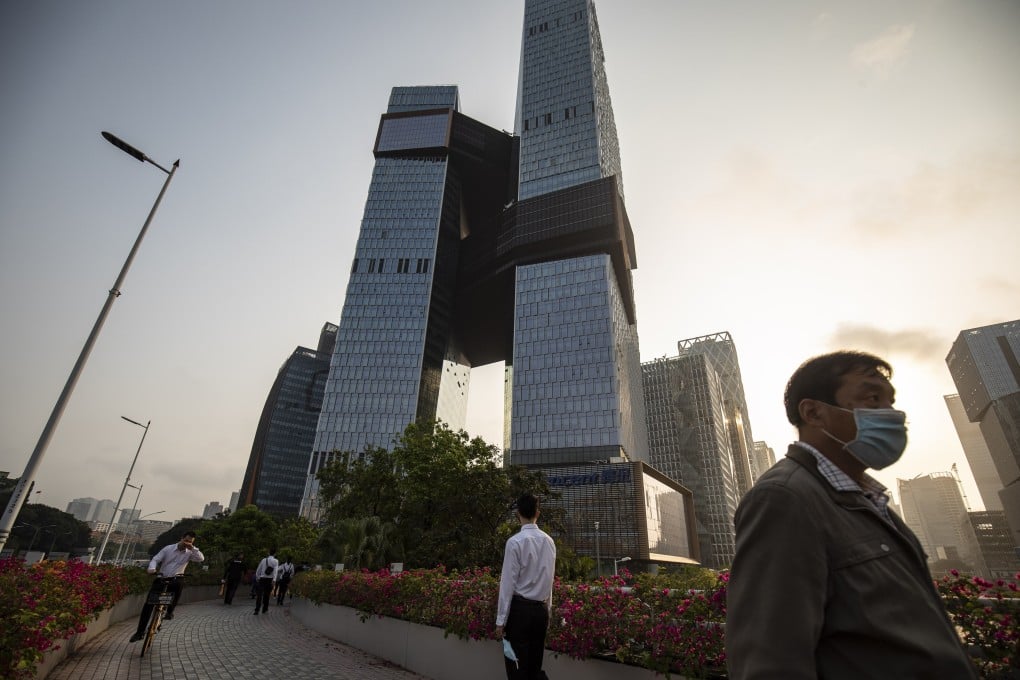 People walk along a pedestrian walkway on March 20, near the Tencent Holdings headquarters in Shenzhen, China’s southern tech hub often compared to Silicon Valley. Beijing’s wide-ranging crackdown on the tech sector has made some of the country’s biggest companies less appealing to talented young workers chasing new wealth. Photo: Bloomberg