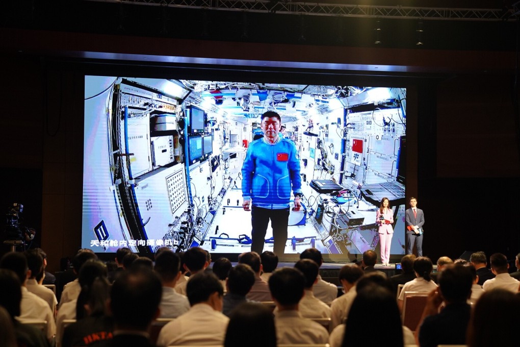 More than 200 students attend a Q&A session on Friday with Chinese astronauts, space engineers and experts. Photo: Xinhua