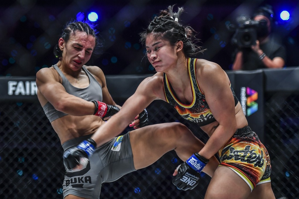 Stamp Fairtex throws a punch at Alyona Rassohyna. Photos: ONE Championship