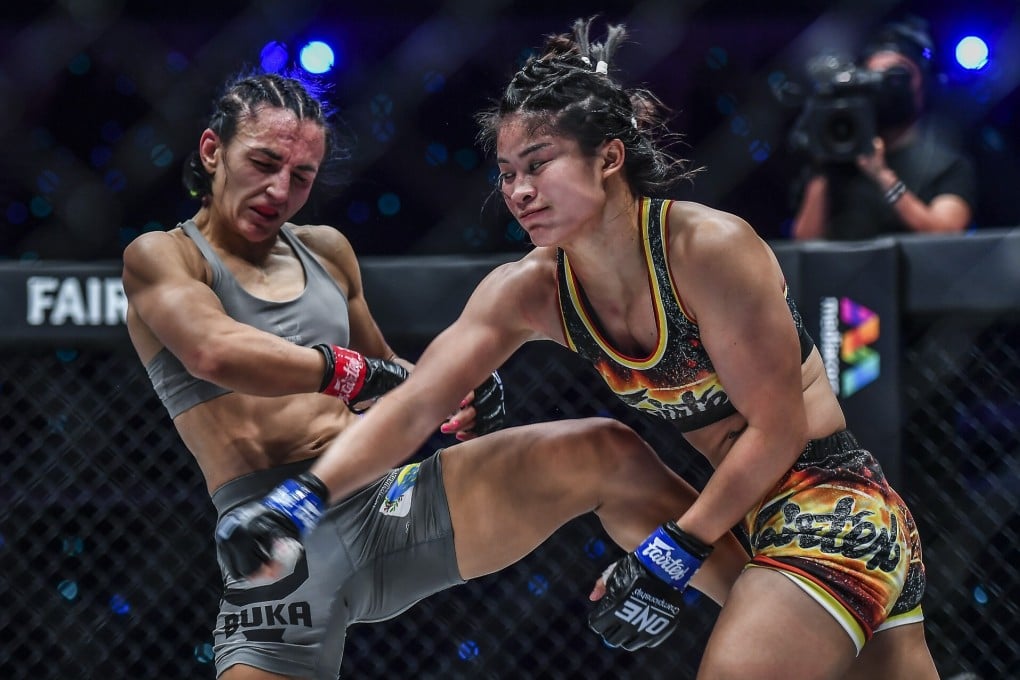 Stamp Fairtex throws a punch at Alyona Rassohyna. Photos: ONE Championship