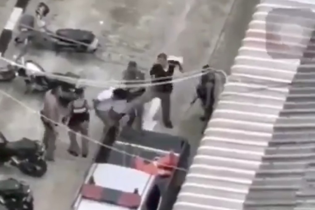 One of the viral videos allegedly shows police officers beating a suspect in Thailand. Photo: Twitter
