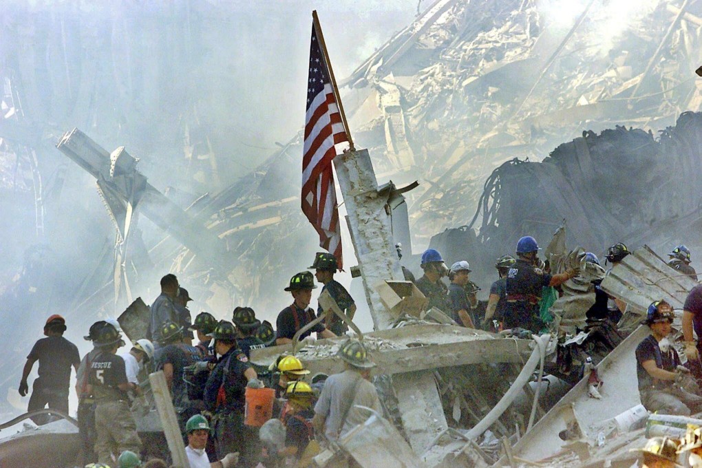 A US flag posted in the rubble of the World Trade Centre in New York in 2001. Photo: EPA-EFE